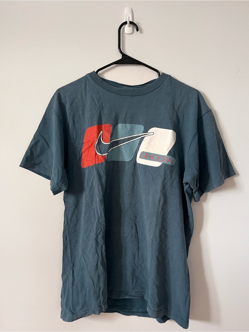 Vintage Nike Men's Teal Graphic Swoosh T-Shirt